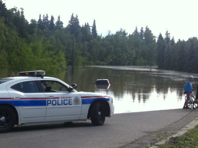 sunken car in a flooded park! Calgary, Alberta Canada