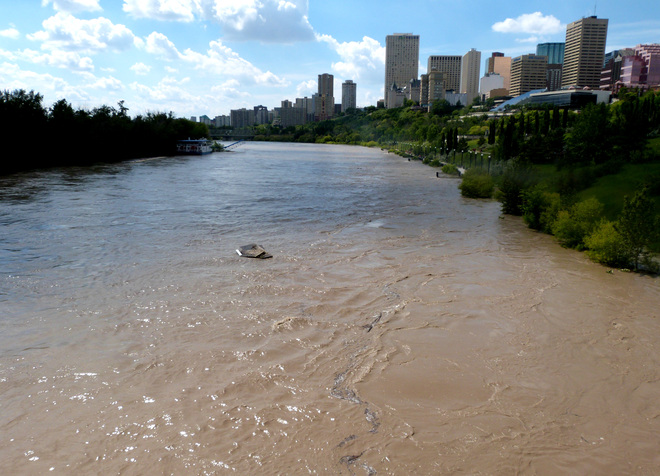 N. Saskatchewan River rising, Edmonton Downtown in B.G. Edmonton, Alberta Canada
