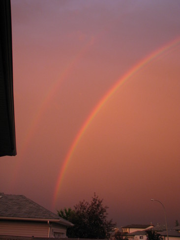 double rainbow from the back of my dect Fort McMurray, Alberta Canada