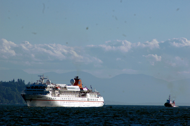 Cruiseship being escorted West Vancouver, British Columbia Canada