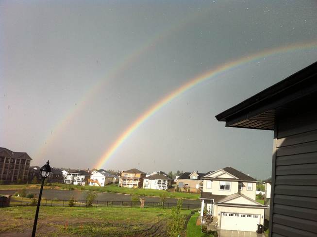 rainbow during hailstorm Leduc, Alberta Canada