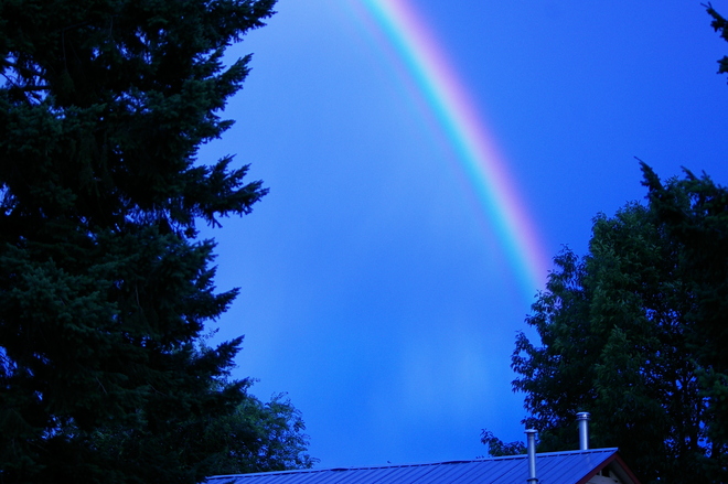 Rainbow in a deep blue sky Kelowna, British Columbia Canada
