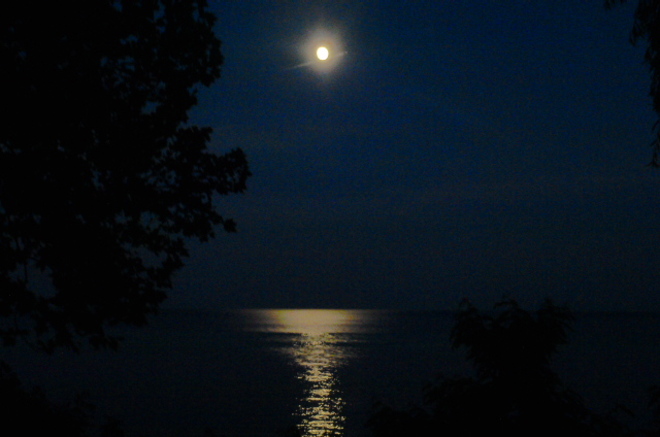 Moon and beam over the Lake Port Dover, Ontario Canada
