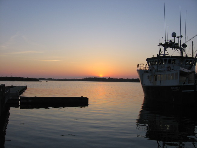 Boat at Sunset Yarmouth, Nova Scotia Canada
