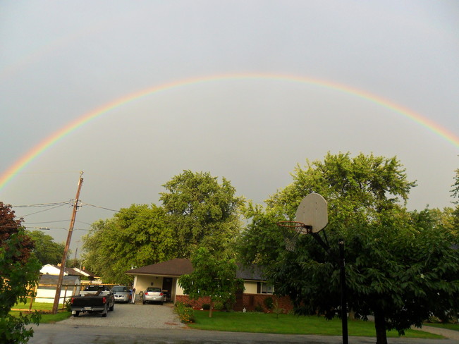 Rainbow between storms Emeryville, Ontario Canada