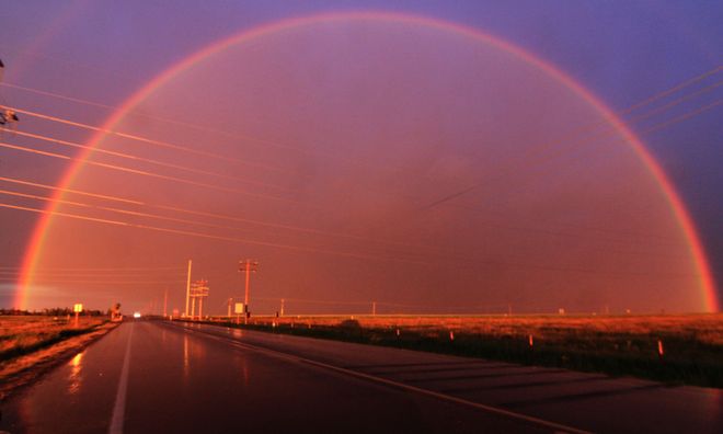 sunset rainbow Brooks, Alberta Canada