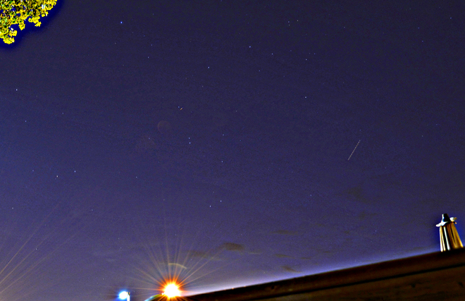 Satellite, stars and a shred of cloud: 