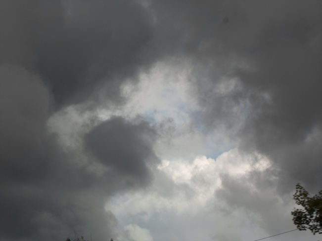 Very Dark Cloud,with blue centre Elliot Lake, Ontario Canada