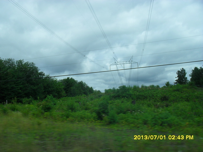 Clear Cut trees around Transmission Lines on an Ovecast day...remembering August Parry Sound, Ontario Canada