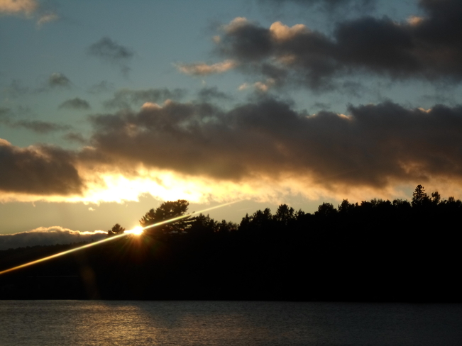 Sunset with beam of light Elliot Lake, Ontario Canada