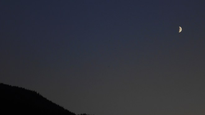 moon and mountain Malakwa, British Columbia Canada