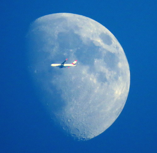 Moon and Plane Hastings, Ontario Canada