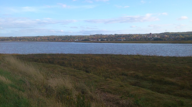 Acadia and Wolfville from across the Cornwallis River on a Fall day Wolfville, Nova Scotia Canada
