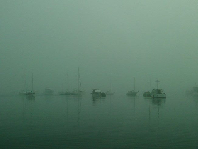 Boats in Fog Cowichan Bay, British Columbia Canada
