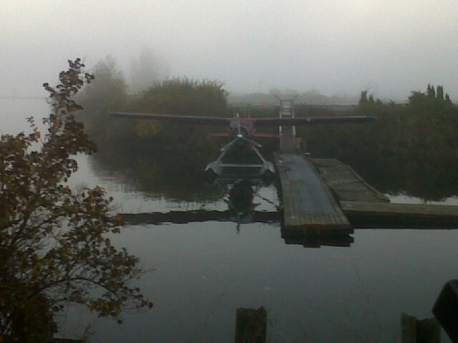 Water plane in fog. Courtenay, British Columbia Canada