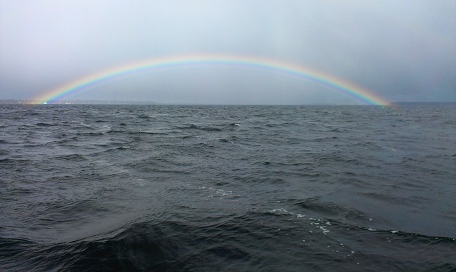 Rainbow after hail and rain at Lake Simcoe North York, Ontario Canada