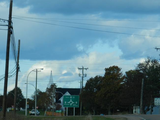 The Church steeple surrounded by clouds!! Montague, Prince Edward Island Canada