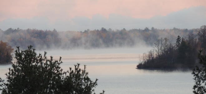 Fall morning misty lake Callander, Ontario Canada