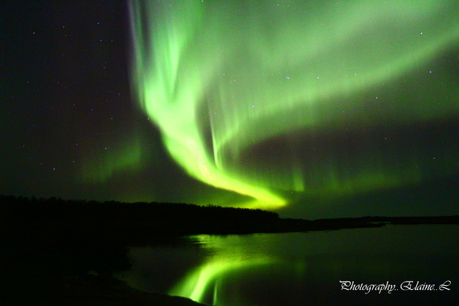 Reflection of the northern lights The Pas, Manitoba Canada
