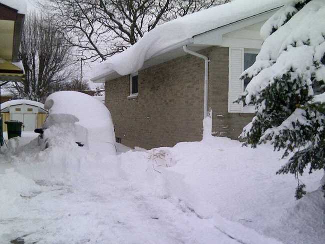 The car is under there... somewhere St. Thomas, Ontario Canada