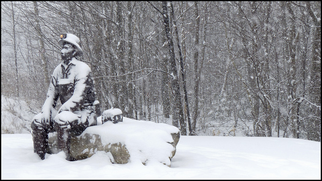 Elliot Lake, Miner sitting in the snow. Elliot Lake, Ontario Canada