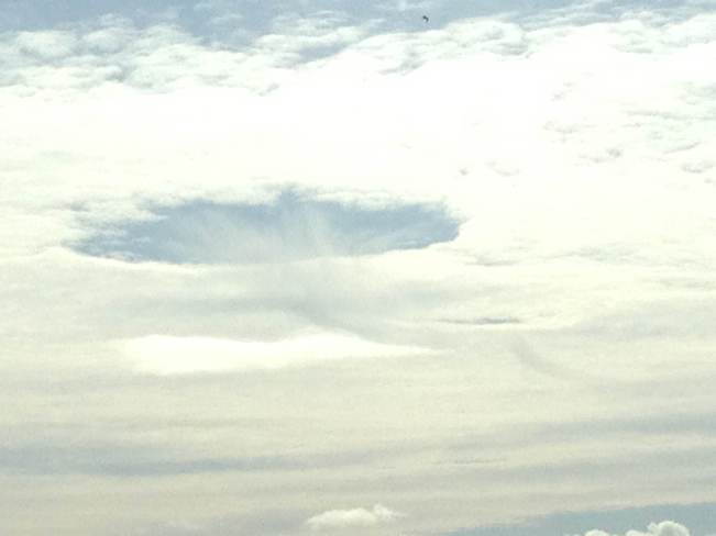 hole punch cloud? Orillia, Ontario Canada