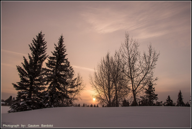 Beautiful Sunrise through thick clouds Edmonton, Alberta Canada