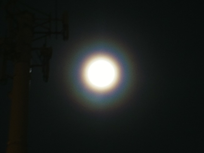 Moon dog over microwave tower Lethbridge, Alberta Canada