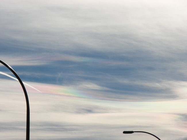 sun dogs through the clouds.Beautiful like a rainbow Calgary, Alberta Canada