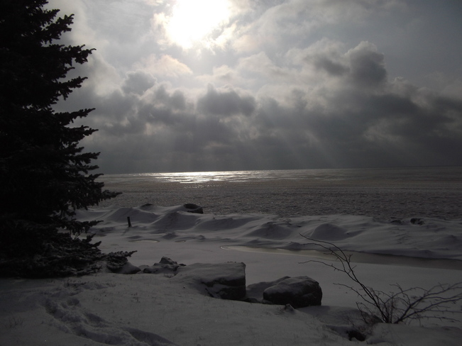 Sunbursts Over Lake Selkirk, Ontario Canada