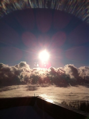sun and steam on Lake Ontario Toronto, Ontario Canada