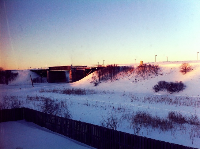 morning sun on a snow hill Thunder Bay, Ontario Canada