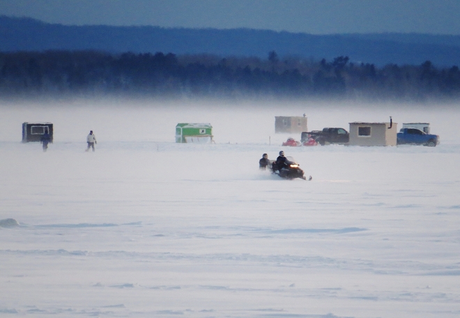 Ice-fishing & snowmobiling the order of the day! North Bay, Ontario Canada