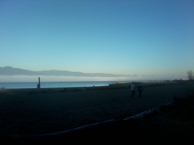 Fog rolling in over the water at Spanish Banks, Vancouver Vancouver, British Columbia Canada