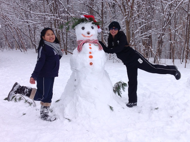 Snowman making Toronto, Ontario Canada