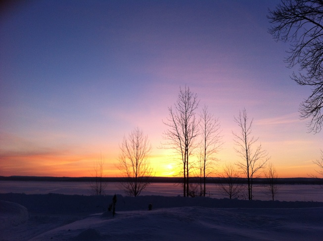 sunrise on ice Balmy Beach, Ontario Canada