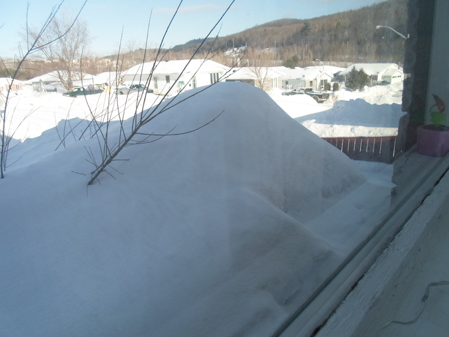 Snow mound in front of my door Elliot Lake, Ontario Canada