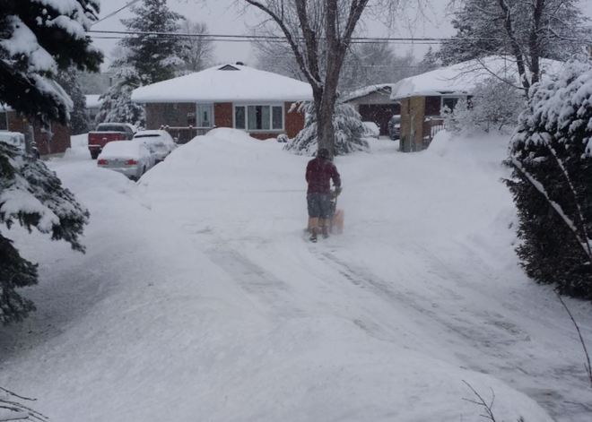Snowblowing in Shorts Sudbury, Ontario Canada