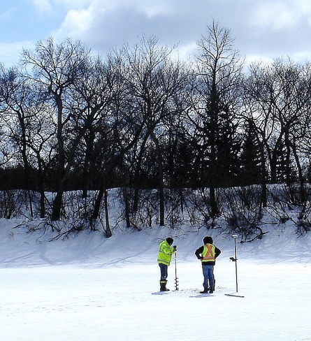 MEASURING THE ICE THICKNESS Winnipeg, Manitoba Canada