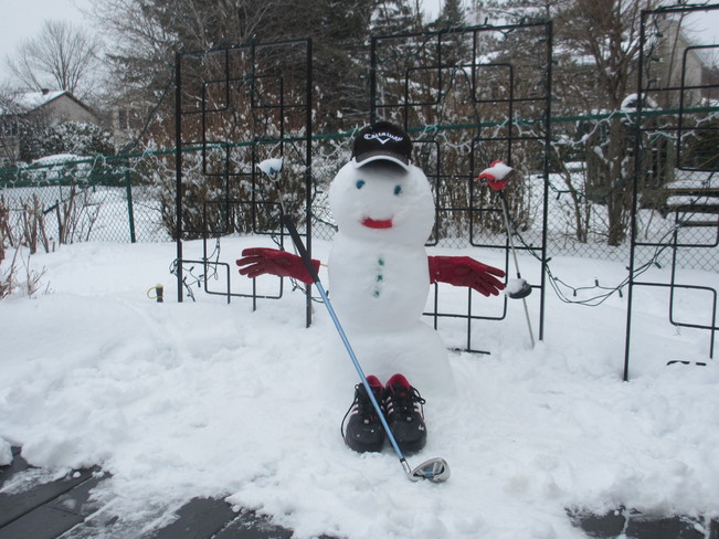 Snow art - Winter Golfer Orleans, Ontario Canada