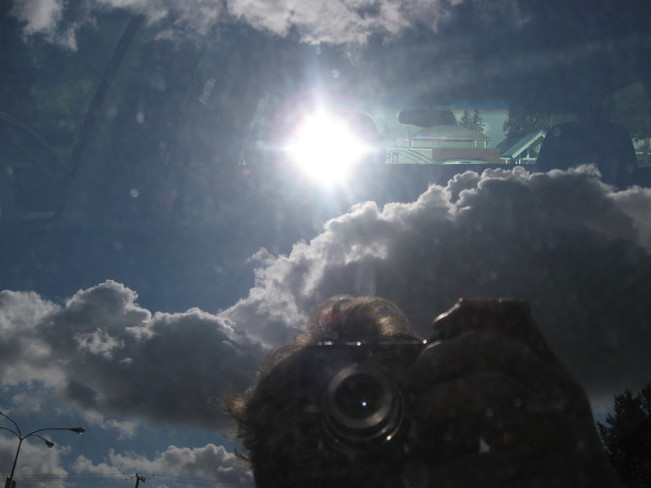me & the sun's reflection through my truck window Surrey, British Columbia Canada