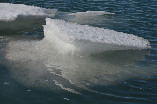 Ice floating at Ghost lake Cochrane, Alberta Canada