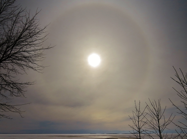 Subdued sun surrounded by Halo. North Bay, Ontario Canada