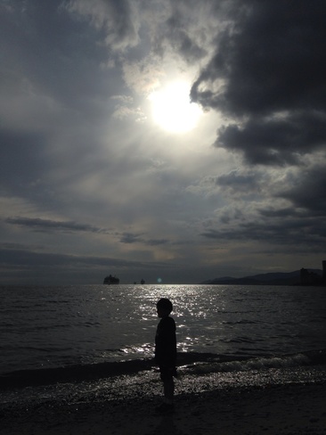 silouette of boy and clouds West Vancouver, British Columbia Canada