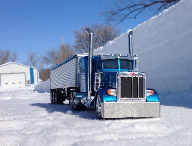 toy truck by snow bank Austin, Manitoba Canada