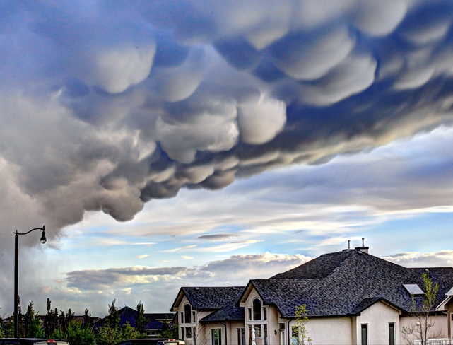 Okotoks Clouds on a Sunday Evening 32 Cimarron Estates Green, Okotoks, AB T1S, Canada