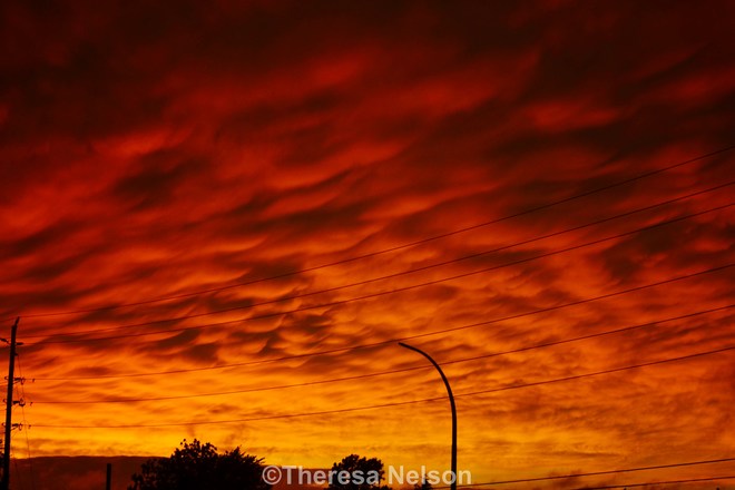 Red orange skies after storm, neat formations Belleville, ON