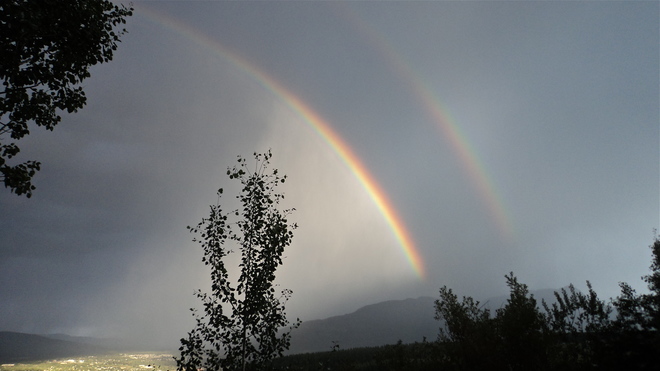 Double rainbow and clouds after a storm 