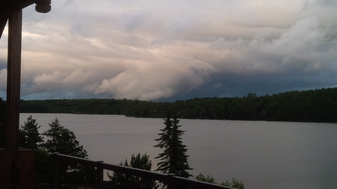 dark funnel like clouds over Raft Lake Raft Lake Sudbury, Ontario
