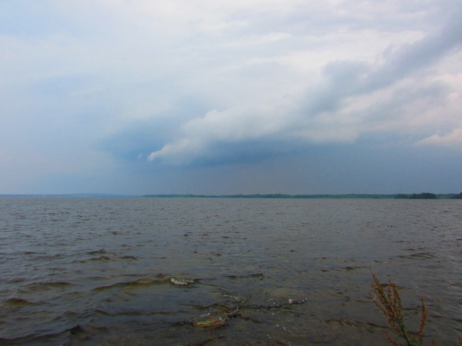 Storm over Quebec border as seen from Chutes-a-Blondeau, Ontario Chute-à-Blondeau, ON